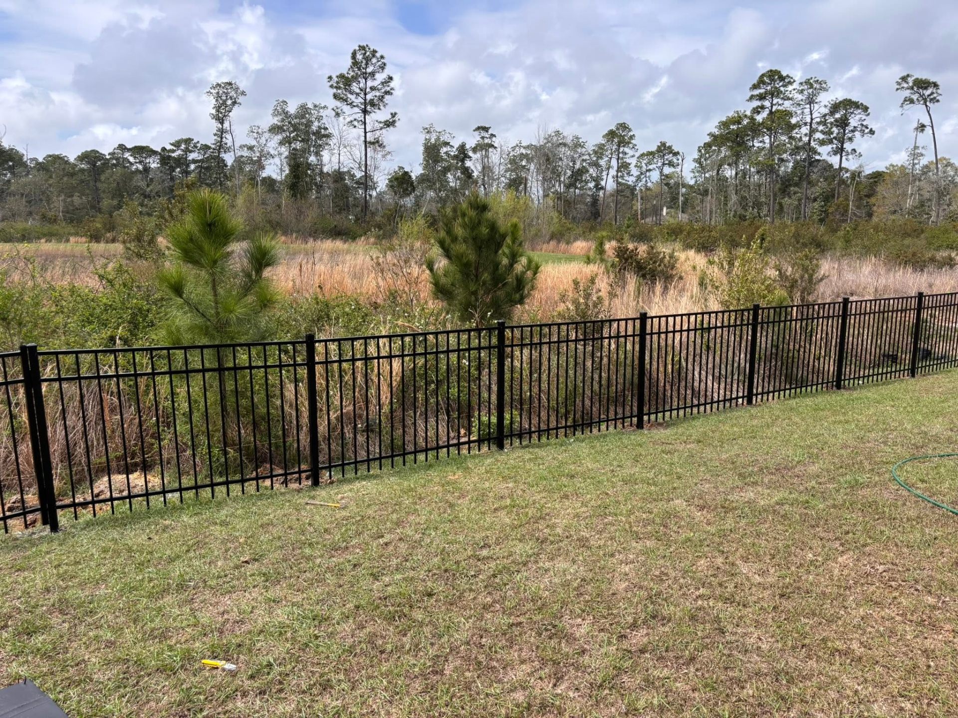 Black aluminum yard perimeter fence